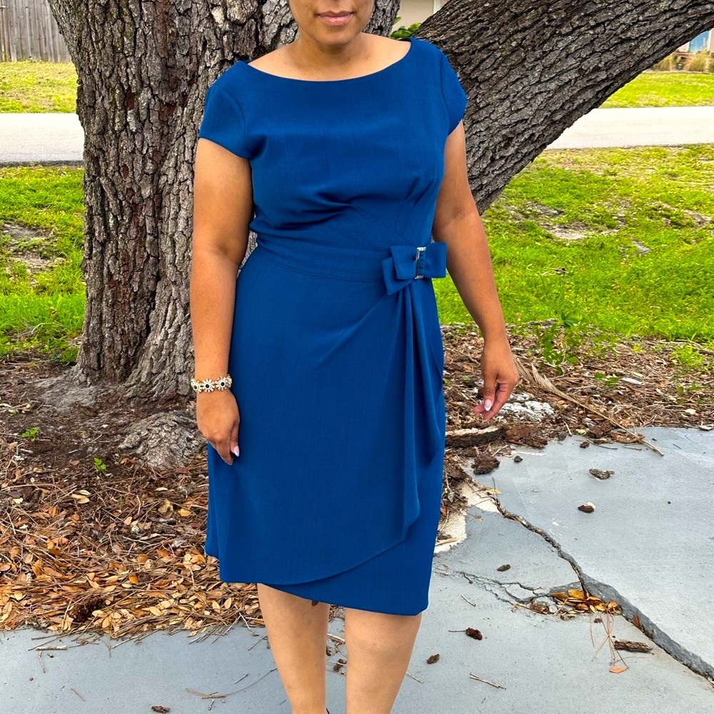 Lovely dress, not my size anymore, only worn twice over the years.